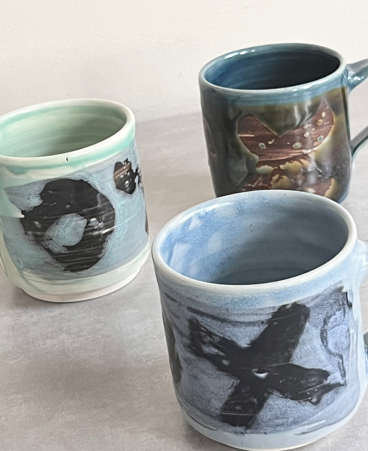 Tim Laurin Hugs + Kisses Mug (three colours)