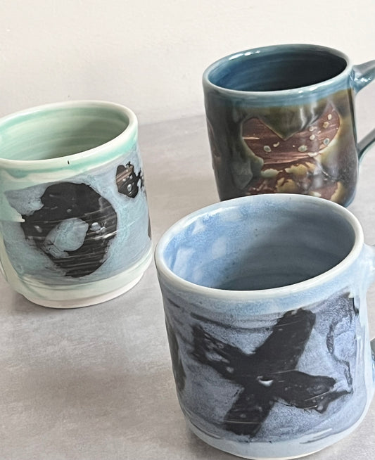 Tim Laurin Hugs + Kisses Mug (three colours)