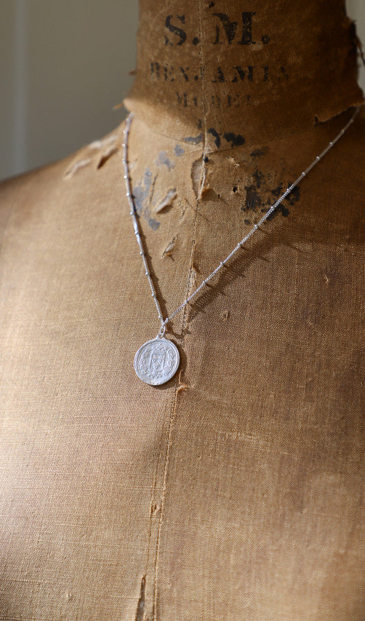 Danielle O'Connor Jewellery Coin Impression Necklace (silver + gold plated)